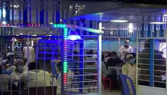 বিধিনিষেধ অমান্য করে রাতে জমায়েত, ভুরিভোজ